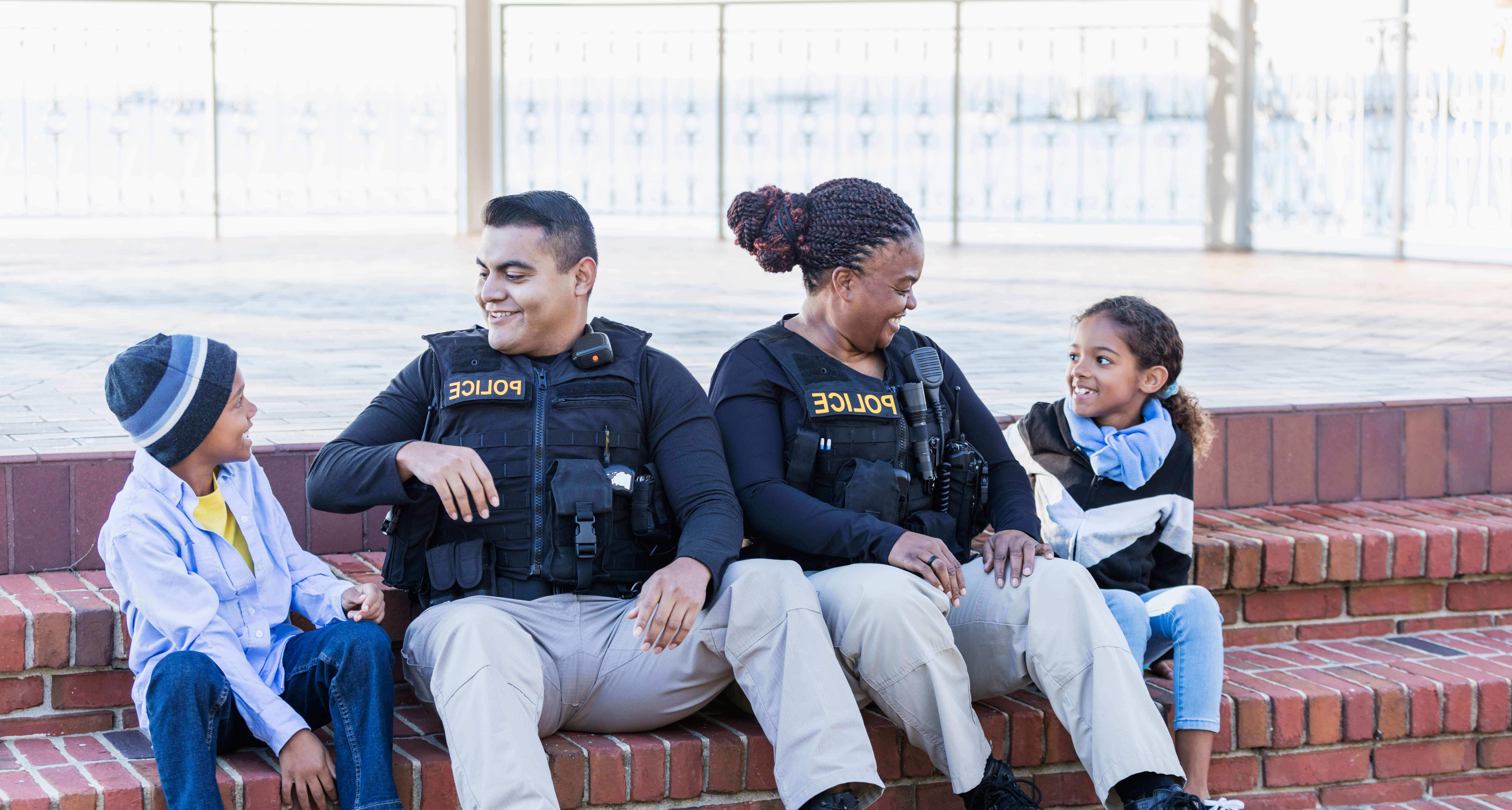 police happily talking with children